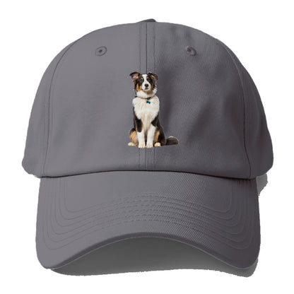 Attentive Australian Shepherd sitting upright Hat