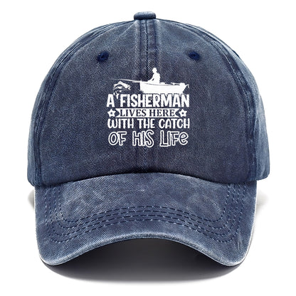 a fisherman lives here with the catch of his life Hat