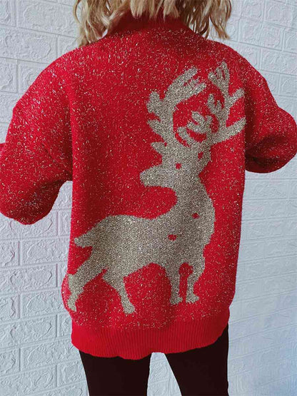 Suéter con cuello redondo y elemento navideño