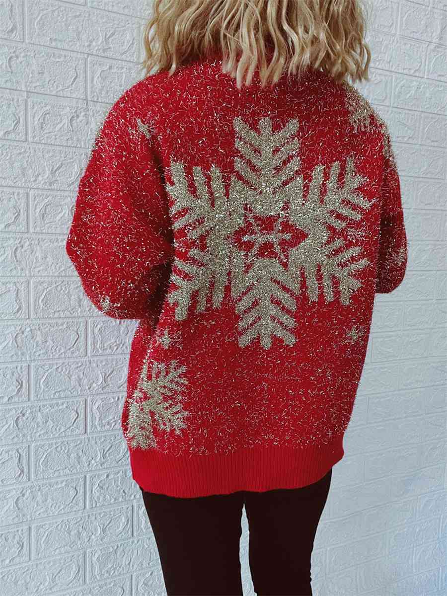 Suéter con cuello redondo y elemento navideño