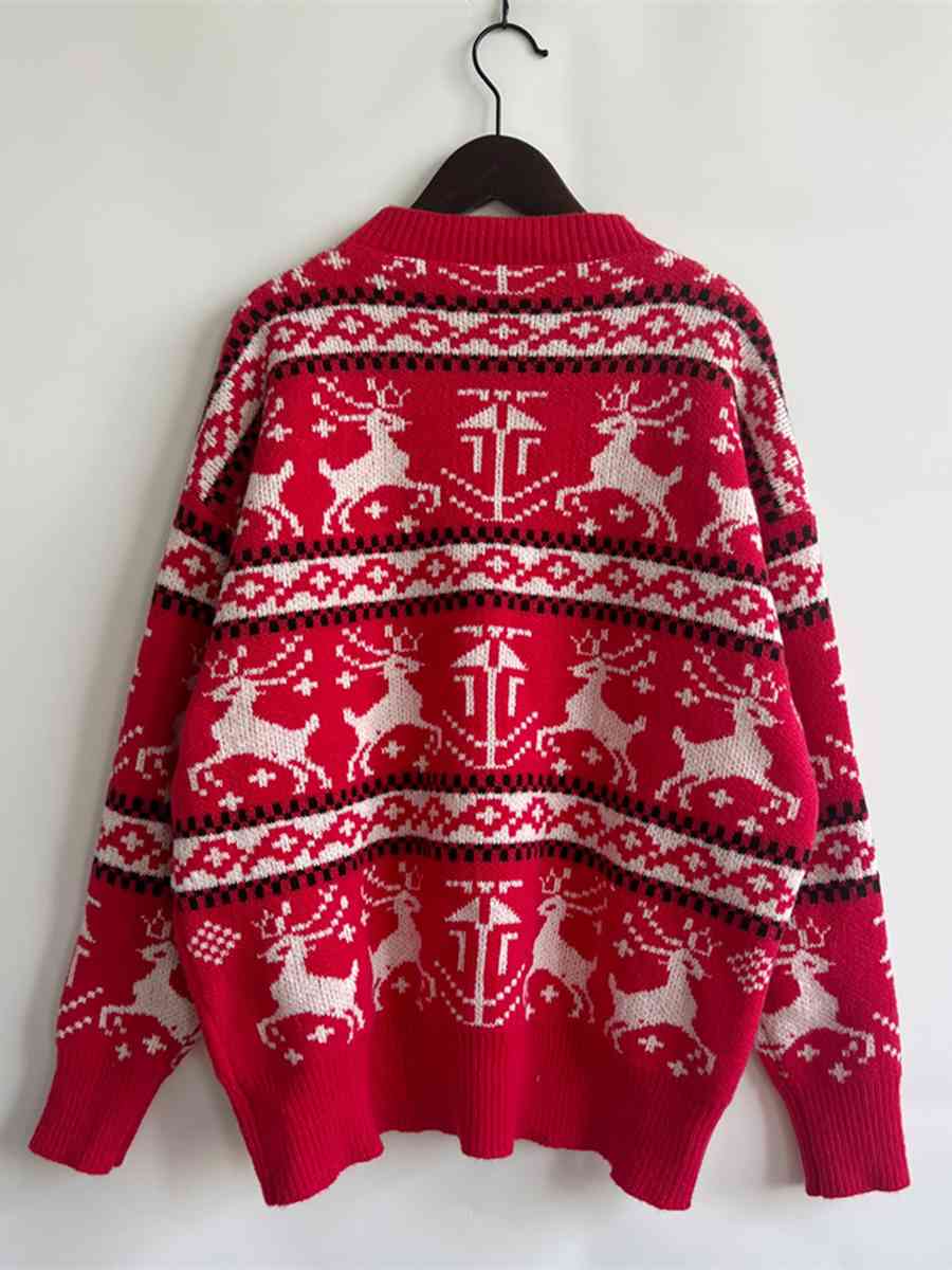 Suéter con hombros caídos y elemento navideño